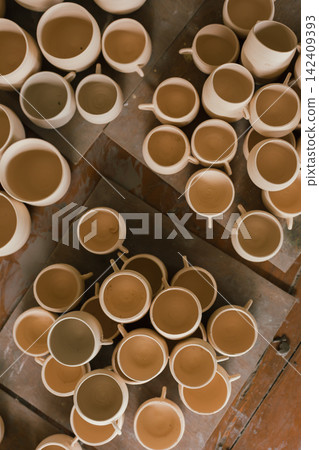 The process of creating pottery. The process of creating pottery. 142409393