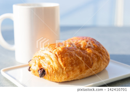 A delicious French chocolate bread breakfast A delicious French chocolate bread breakfast 142410701