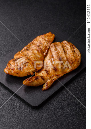 Grilled chicken steak seasoned with salt and spices. Chicken steak 142412331