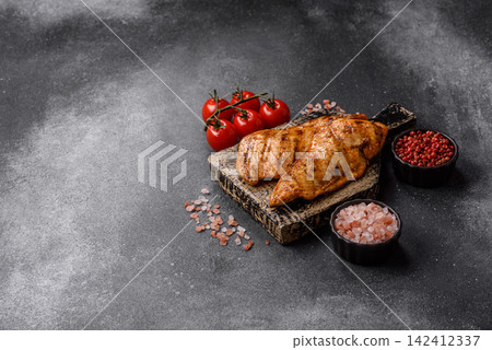 Grilled chicken steak seasoned with salt and spices. Chicken steak 142412337