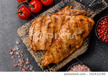 Grilled chicken steak seasoned with salt and spices. Chicken steak 142412340