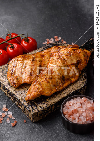 Grilled chicken steak seasoned with salt and spices. Chicken steak Grilled chicken steak seasoned with salt and spices. Chicken steak 142412341