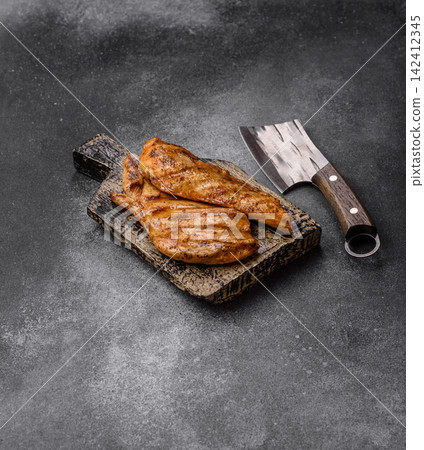Grilled chicken steak seasoned with salt and spices. Chicken steak 142412345