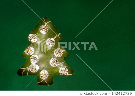 Mirror Disco Ball Lights in Christmas Tree Cutout Mirror Disco Ball Lights in Christmas Tree Cutout 142412729