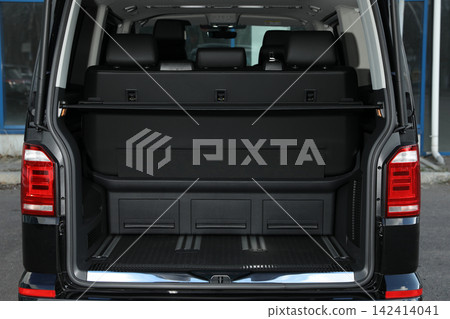 Modern car with open empty trunk outdoors Modern car with open empty trunk outdoors 142414041