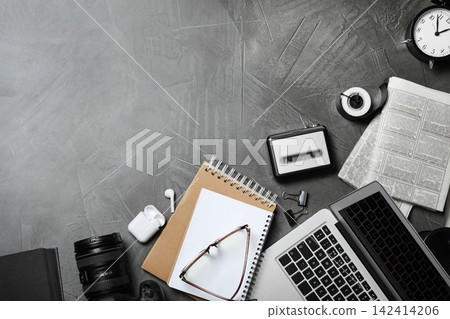 Flat lay composition with equipment for journalist on grey table, space for text Flat lay composition with equipment for journalist on grey table, space for text 142414206