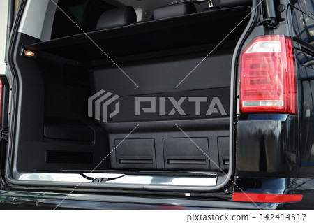 Open empty capacious trunk of modern car Open empty capacious trunk of modern car 142414317