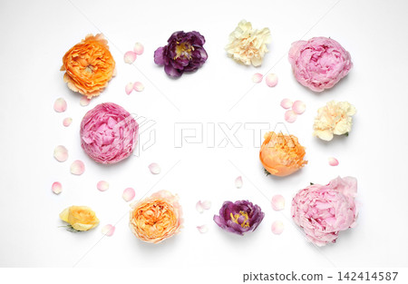 Frame made of beautiful flowers on white background, flat lay with space for text. Floral composition Frame made of beautiful flowers on white background, flat lay with space for text. Floral composition 142414587