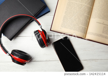 Flat lay composition with books on white wooden table Flat lay composition with books on white wooden table 142415114