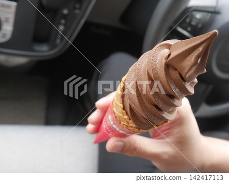 Chocolate soft serve ice cream (photographed from above) 142417113