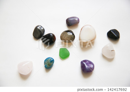Colorful stones on a white background Colorful stones on a white background 142417692