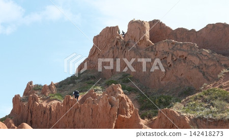 Skazka Canyons or so called Fairytale Canyons Issyk-Kul region near the lake in drone point of view in kyrgyzstan Skazka Canyons or so called Fairytale Canyons Issyk-Kul region near the lake in drone point of view in kyrgyzstan 142418273