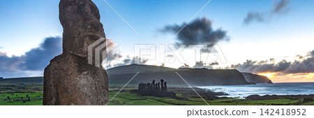 Iconic Ahu Tongariki Moai Statues Standing in a Row by the Ocean on Easter Island, Valparaiso, Chile. Banner Web, Copy Space Iconic Ahu Tongariki Moai Statues Standing in a Row by the Ocean on Easter Island, Valparaiso, Chile. Banner Web, Copy Space 142418952