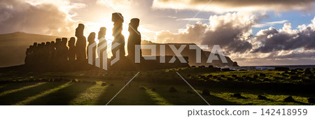 Iconic Ahu Tongariki Moai Statues Standing in a Row by the Ocean on Easter Island, Valparaiso, Chile. Banner Web, Copy Space Iconic Ahu Tongariki Moai Statues Standing in a Row by the Ocean on Easter Island, Valparaiso, Chile. Banner Web, Copy Space 142418959