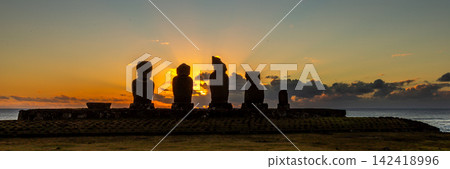 Tahai Archaeological Complex with Moai Statues on Stone Platforms at Sunset on Easter Island, Valparaiso, Chile. Banner Web, Copy Space Tahai Archaeological Complex with Moai Statues on Stone Platforms at Sunset on Easter Island, Valparaiso, Chile. Banner Web, Copy Space 142418996