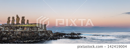 Tahai Archaeological Complex with Moai Statues on Stone Platforms at Sunset on Easter Island, Valparaiso, Chile. Banner Web, Copy Space Tahai Archaeological Complex with Moai Statues on Stone Platforms at Sunset on Easter Island, Valparaiso, Chile. Banner Web, Copy Space 142419004