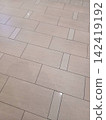 Light reflected off the floor tiles 142419192
