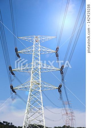Transmission towers in the mountains Transmission towers in the mountains 142419286