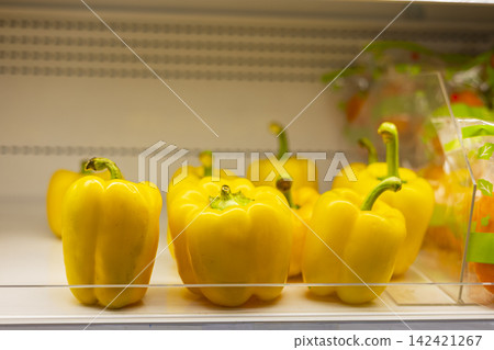Yellow Bell Peppers On Supermarket Shelf Yellow Bell Peppers On Supermarket Shelf 142421267