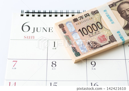 1 million yen and a June calendar 1 million yen and a June calendar 142421610