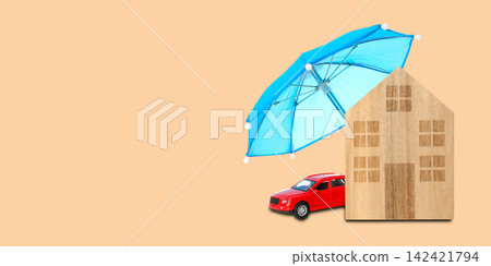 Insurance. House and car placed under an umbrella on a simple background Insurance. House and car placed under an umbrella on a simple background 142421794