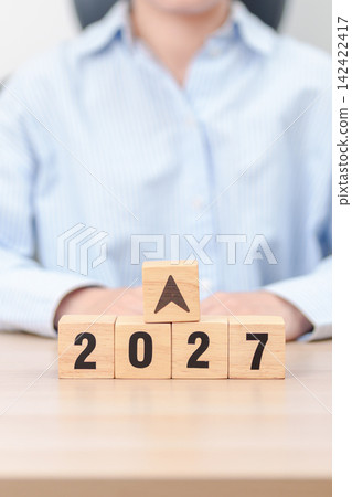 2027 New year with change to UP and Down arrow. Interest rate, GDP, stocks market, financial, deflation and Inflation, mortgage, debt, Loan and Economic Recession 2027 New year with change to UP and Down arrow. Interest rate, GDP, stocks market, financial, deflation and Inflation, mortgage, debt, Loan and Economic Recession 142422417