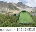 Green tent at the Col du Galibier, a mountain pass in the French Alps 142424515