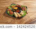 Thai food entries spread featuring flavorful fried chicken, aromatic curry 142424520