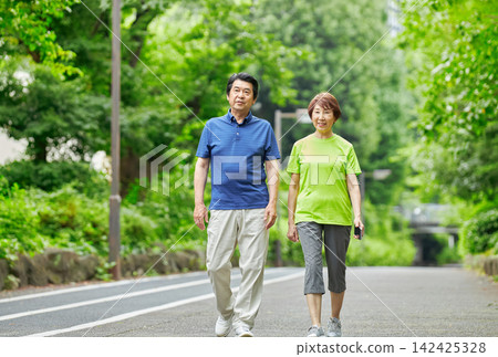 A senior couple going for a walk A senior couple going for a walk 142425328