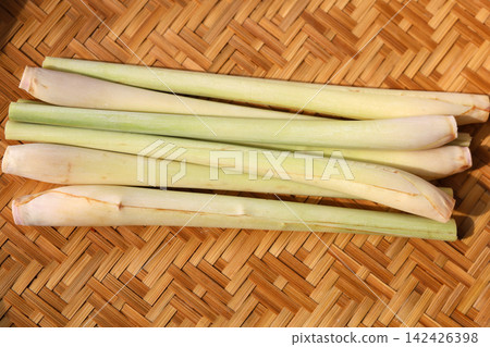 Fresh lemongrass stalks, a healthy herb and vegetable for cooking. Fresh lemongrass stalks, a healthy herb and vegetable for cooking. 142426398