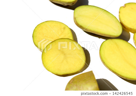 Raw potatoes on a white background. Raw potatoes on a white background. 142426545