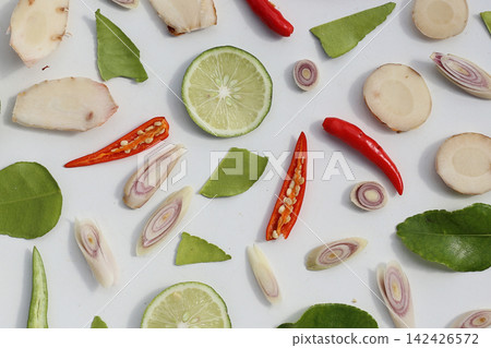 Fresh Tom Yum ingredients laid out on a white cutting board. Fresh Tom Yum ingredients laid out on a white cutting board. 142426572