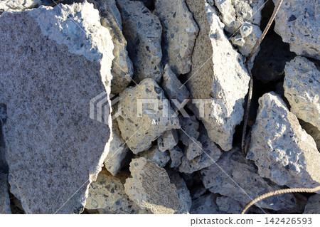 Broken concrete rubble and rebar debris close up Broken concrete rubble and rebar debris close up 142426593