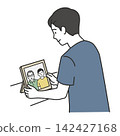An illustration of a son displaying a family photo of his father in a photo frame. 142427168