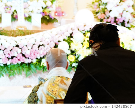 Ceremony ladies bowing towards the altar Ceremony ladies bowing towards the altar 142428567