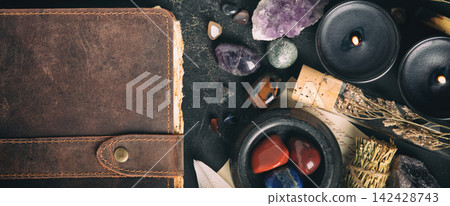 Flat Lay of Healing Crystals and Aromatic Candles with Leather Journal Flat Lay of Healing Crystals and Aromatic Candles with Leather Journal 142428743