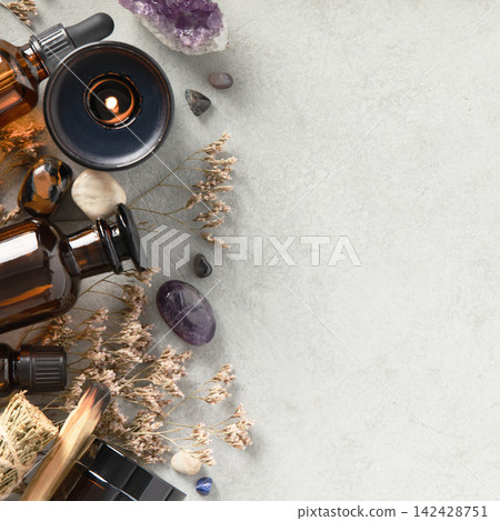 Aromatherapy Bottles with Dried Herbs and Healing Crystals Aromatherapy Bottles with Dried Herbs and Healing Crystals 142428751