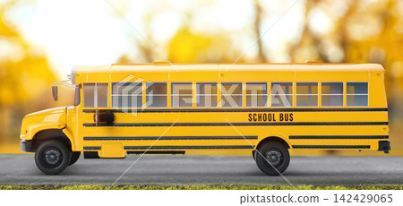 Yellow school bus on road outdoors. Transport for students Yellow school bus on road outdoors. Transport for students 142429065