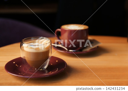 Aromatic coffee on wooden table in cafe. Space for text Aromatic coffee on wooden table in cafe. Space for text 142431234