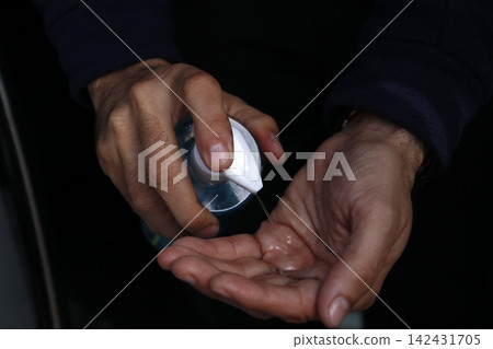 Cleaning hands with soap 142431705