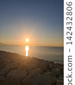 Panorama of a beautiful sunrise over the sea off the coast of Naples, Italy 142432806