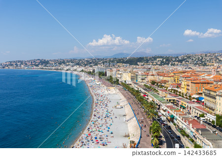 A beach scene in Nice, Southern France, in the middle of summer. A beach scene in Nice, Southern France, in the middle of summer. 142433685