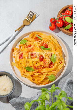 Homemade Tagliatelle Pasta with Tomato Sauce, Basil and Parmesan Homemade Tagliatelle Pasta with Tomato Sauce, Basil and Parmesan 142433745