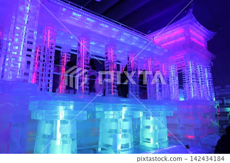 Illuminated Ice Palace with Neon Lights at Night 142434184