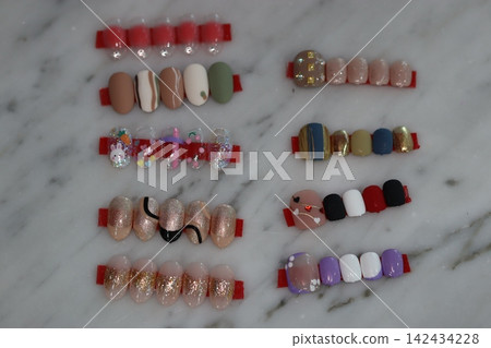 Colorful Nail Art Designs on Marble Surface Colorful Nail Art Designs on Marble Surface 142434228