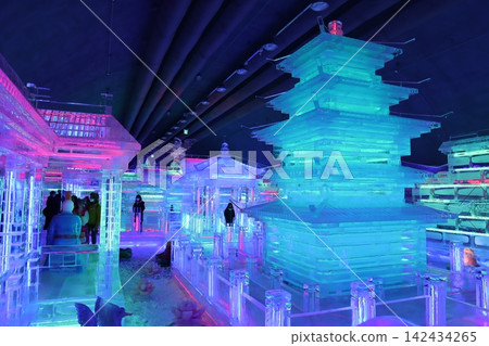 Illuminated Ice Pagoda and Structures in Indoor Exhibition Illuminated Ice Pagoda and Structures in Indoor Exhibition 142434265