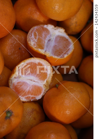 Fresh Orange Fruit Close-up with Sliced View Fresh Orange Fruit Close-up with Sliced View 142434359