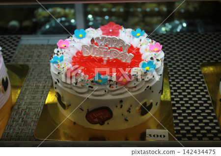 Birthday cake with colorful decoration and Happy Birthday topper Birthday cake with colorful decoration and Happy Birthday topper 142434475
