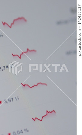 Vertical video. Investor checking Bitcoin, Ethereum and other altcoin cryptocurrency price index on mobile phone screen. Vertical video. Investor checking Bitcoin, Ethereum and other altcoin cryptocurrency price index on mobile phone screen. 142435137
