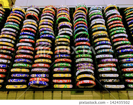 Chinese Traditional Bangles For Sale At A Souvenir Shop In Beijing, China. Chinese Traditional Bangles For Sale At A Souvenir Shop In Beijing, China. 142435502